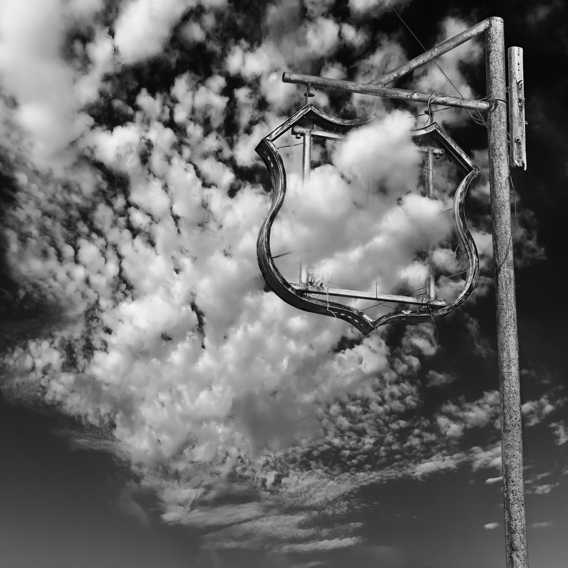Red-River-Sign-with-clouds